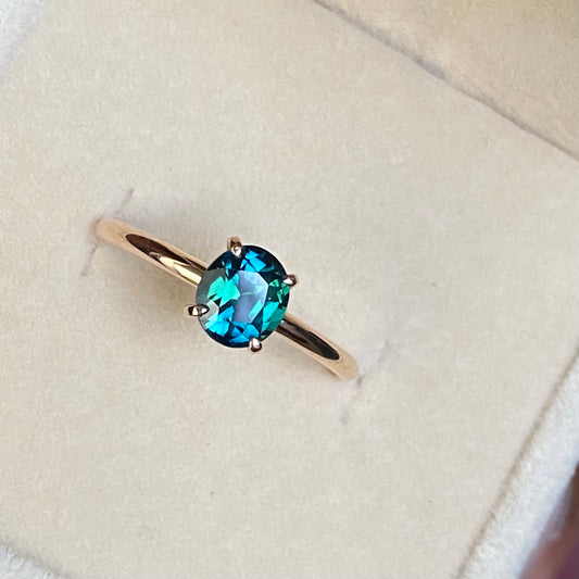 Oval Peacock Sapphire simple solitaire ring, 14K Rose gold.