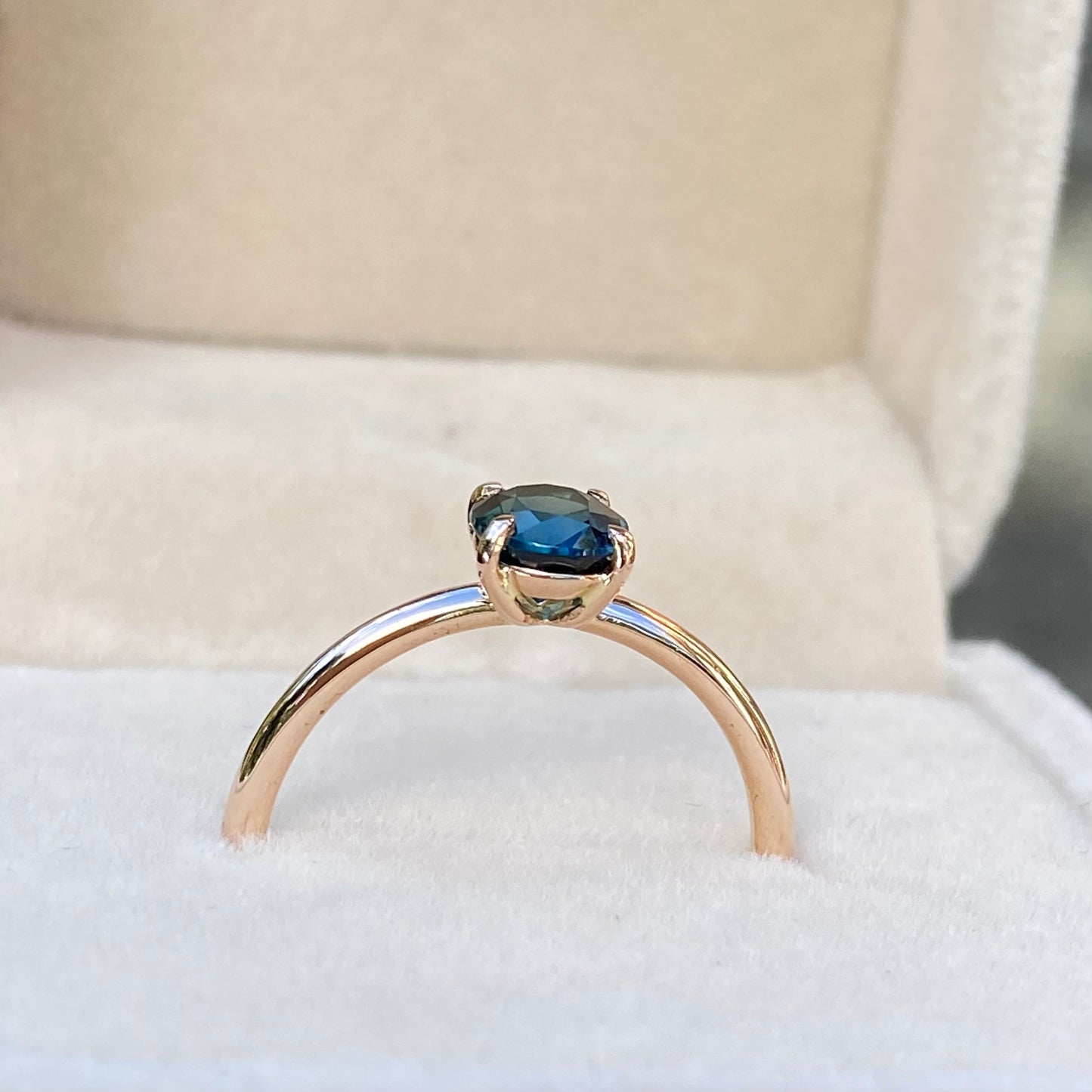 Oval Peacock Sapphire simple solitaire ring, 14K Rose gold.